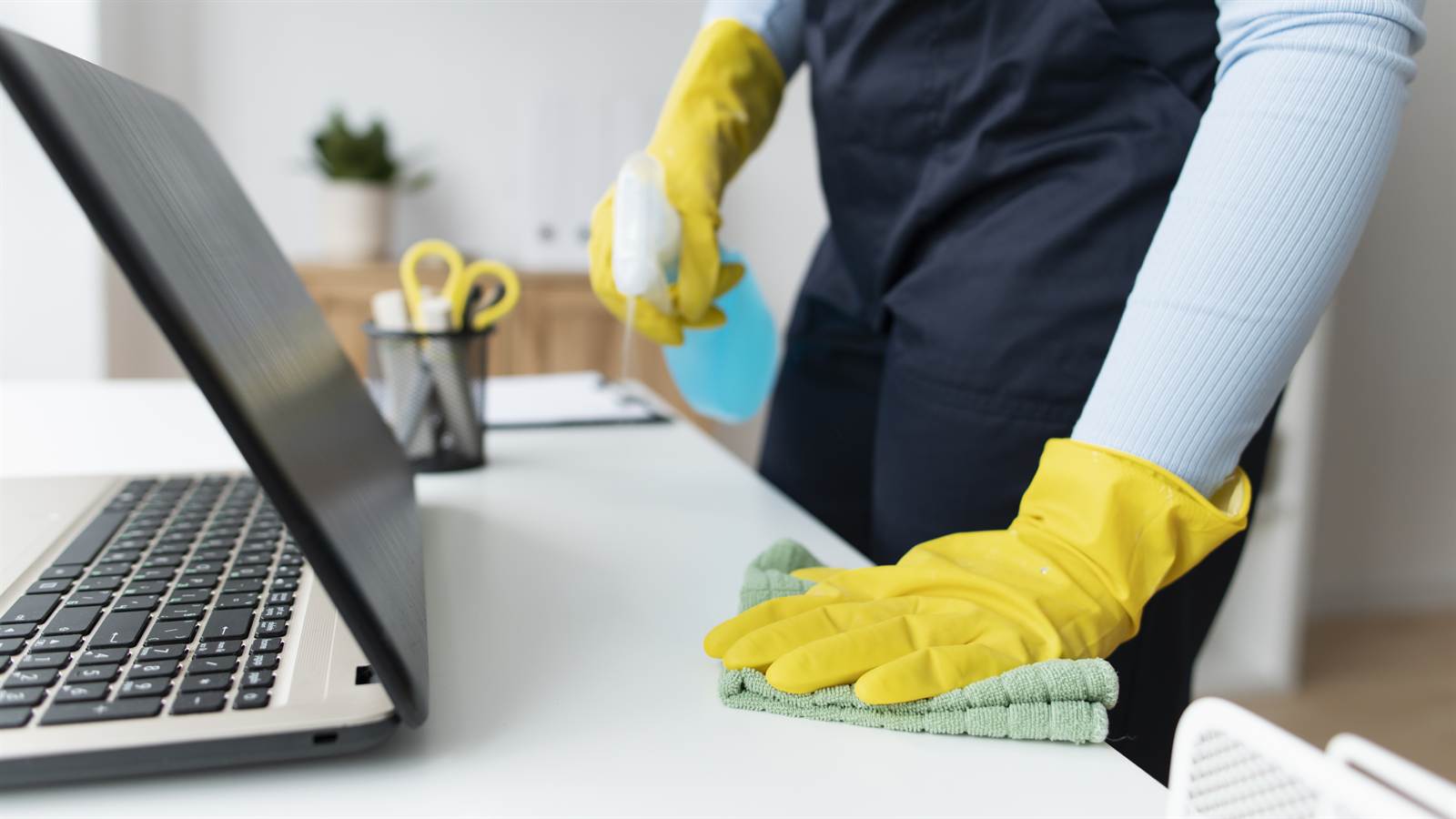 Wiping down an office desk